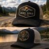 Black Wild & Free Road Born Custom Embroidered Patch Trucker Hat with skull design, personalized adventure cap